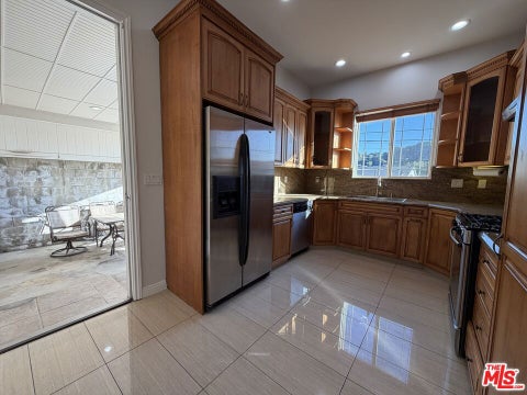 Photo of 10006 Samoa Avenue, Tujunga, CA 91042 (MLS # 26870757)