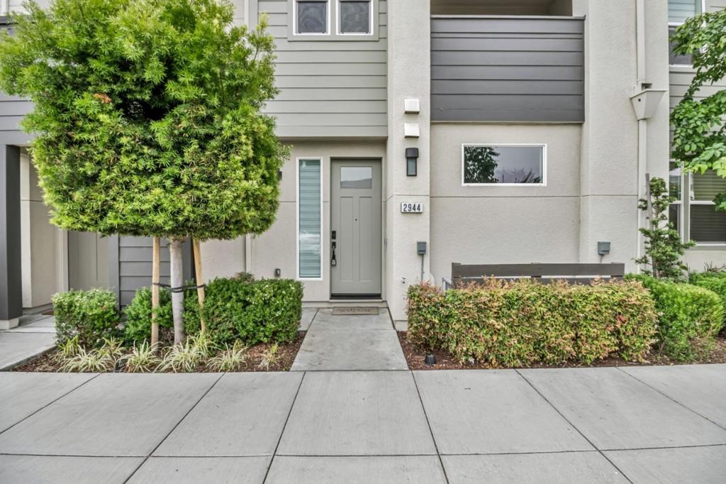 Bright and light, better than new 2BR/2.5BA home in Nuevo blends modern style with everyday convenience. The open concept great room offers ample space for dining and entertaining, extended by a balcony overlooking the community park. A modern kitchen features sleek quartz countertops, SS appliances, and abundant cabinetry. Two spacious en-suite bedrooms, with the primary suite including a walk-in closet and dual-sink bathroom. A handy 1st floor powder room is perfect for guests. In-unit laundry, central A/C, upscale window coverings, whole-house water treatment, and a 2-car garage with EV charging make daily life easy. You're steps from the park and playground for effortless kid time and fresh air breaks. Minutes to big tech, Nvidia, Apple, Google, Meta....so your commute is short and your evenings are yours. Residents enjoy resort style amenities: community center, playground, dog park, basketball court, picnic areas, and an outdoor movie lawn. Costco, Whole Foods, dining, and shopping are a quick hop away, with easy routes via Hwy 101/237, Central & Lawrence Expressways, and Caltrain. Impeccably maintained and in excellent condition, this home is the low-maintenance Silicon Valley base you've been hunting for -- lifestyle, convenience and design in one smart package.