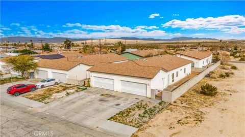 Photo of 6453 Athol Avenue, 29 Palms, CA 92277 (MLS # JT26028298)
