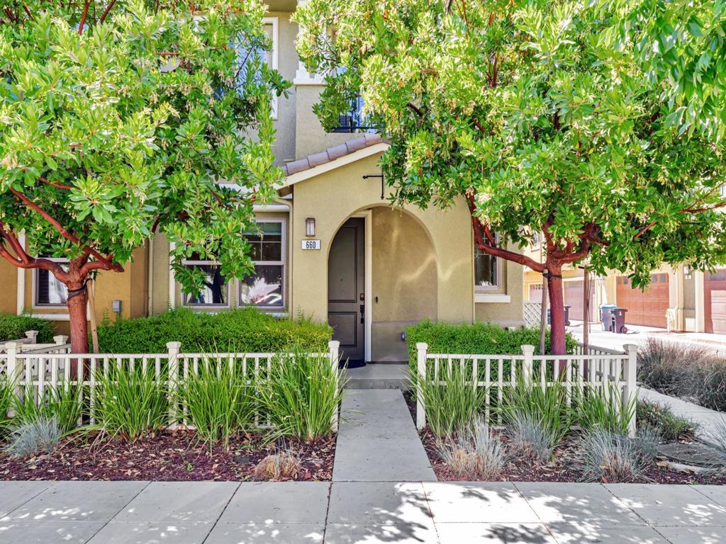 Welcome to this spacious and thoughtfully designed 4 bed, 3.5 bath tri-level townhouse in the highly sought-after 6Sixty community. As one of the largest floor plans in the complex, this home offers abundant natural light, modern finishes, and exceptional functionality throughout. The ground level features a private bedroom and a full bathroom, perfect for guests, in-laws, or a home office, along with a side-by-side two-car garage. On the main level, enjoy open-concept living with wood floors, high ceilings, and a gourmet kitchen featuring a large center island, stone countertops, stainless steel appliances, a pantry, and premium finishes. A built-in desk nook, powder room, and balcony add both style and convenience. Upstairs, you will find three generously sized bedrooms, including a luxurious primary suite with a walk-in closet and dual-sink vanity. Located on a quiet, tree-lined street just steps from Evandale Park, this home is minutes from Google, Microsoft, NASA, and other major tech campuses, with easy access to Highway 101, 85, 237, Caltrain, Light Rail, and Stevens Creek Trail.