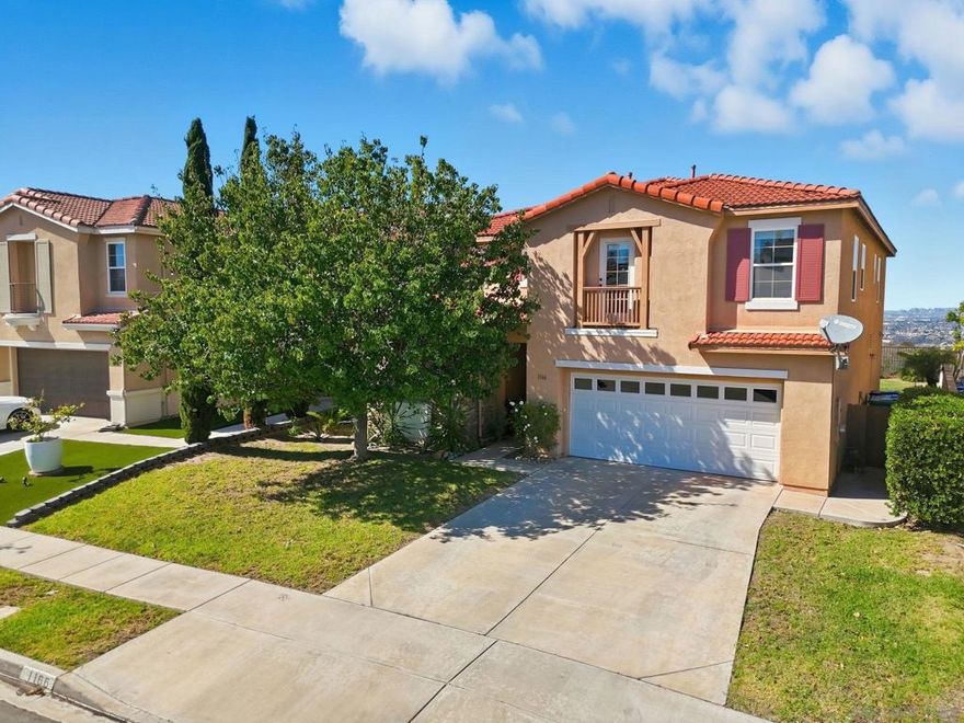 Beautiful home with 5 Bedrooms and 3 Bathrooms and amazing panoramic views. This home features 1 bedroom down stairs with a full bathroom. Also one of the bedrooms upstairs is currently a loft (builder option). First time this home is on the market and it has been immaculately cared for by owners. Master suite has very large bathroom with his and hers walk in closets and a large balcony with breathtaking views of all San Diego. Home also features high ceilings, fireplace, granite counter tops, laundry room, and grapevines. You must see this house and view in person!