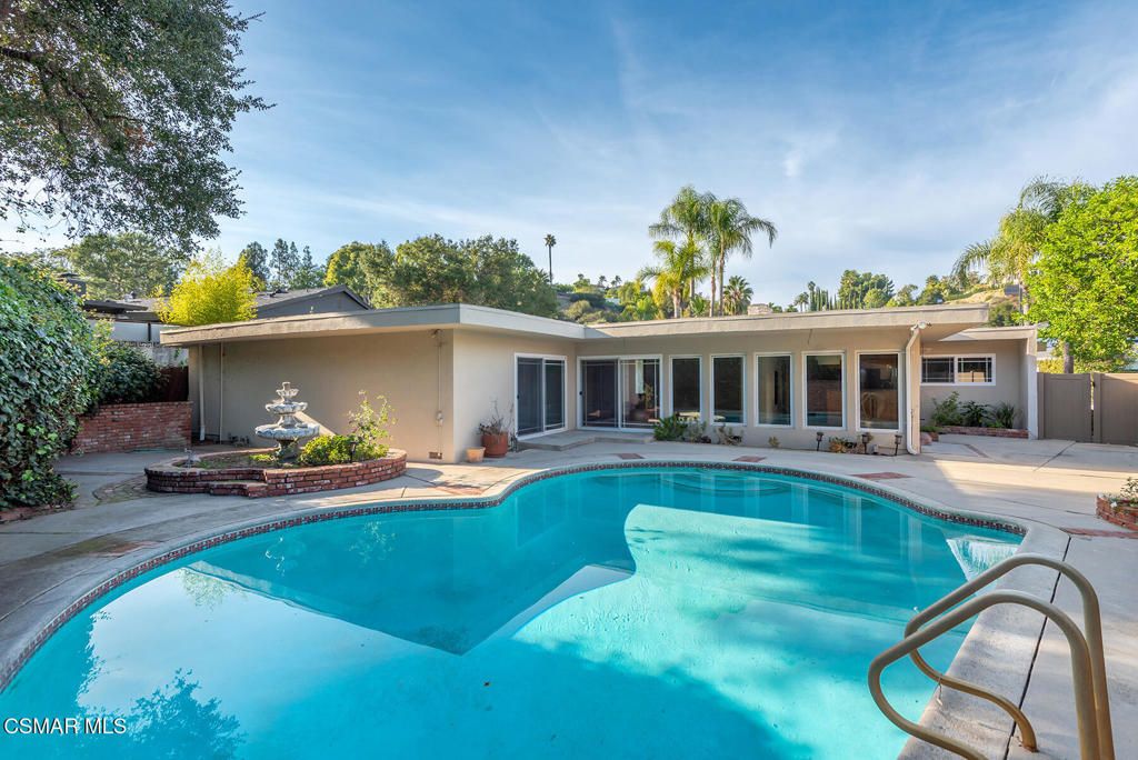 Photo of 16138 Meadowcrest Road, Sherman Oaks, CA 91403 (MLS # 225005557)