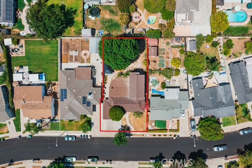 Motivated seller.  Price reduction.  Turnkey property features with 4 bedrooms and 2 baths with a huge master suite which is located on the whole second floor of the property.  Title shows 1647 sq ft but the actual sq ft is 1949 due to the previous owner converted the patio to a living room.  Property has been totally remodeled inside out with the most updated stylish materials. Owner has spent large amount of money to remodel the house with new kitchen, new bathrooms, new flooring, new and the most updated kitchen appliances, new paint inside out, new AC split units, new sprinklers throughout the front and back yard with new grasses. Large big yard with new built-in BBQ and pavilion which provides enough space for family gatherings and entertainment. Great school districts. Large living and family rooms, open kitchen with dine-in bar counter tops and large dining area for daily dinning and family events.  300 sq ft of family room was converted by the previous owner from a covered patio.  Close to shops, schools, parks and so on. Don't miss the opportunity to check out this wonderful property.