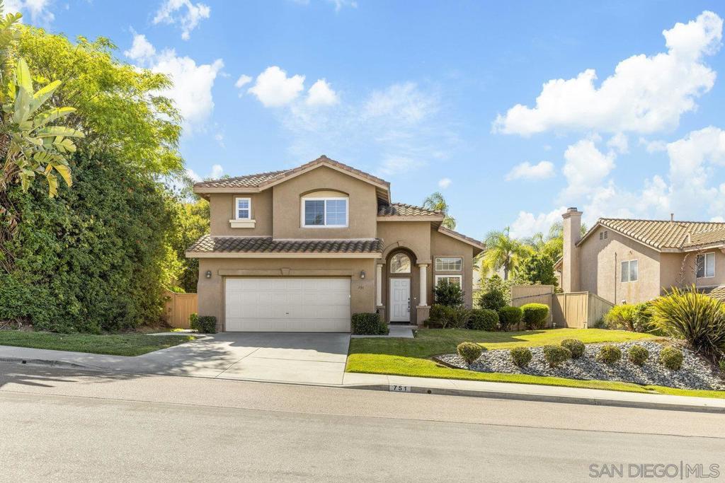 Located in Santa Fe Hills, San Marcos, this well-maintained 3-bed, 2.5-bath home features hardwood floors, plantation shutters, and an open floor plan with plenty of natural light. The open-concept kitchen connects to the living and dining areas, suitable for everyday living and entertaining. The backyard includes a covered patio for outdoor activities. Additional features: central A/C, custom garage cabinets, built-in shelving, and epoxy garage floors. Within walking distance to Paloma Elementary School and community parks, this home suits families looking for convenience. Move-in ready and available now in Santa Fe Hills!