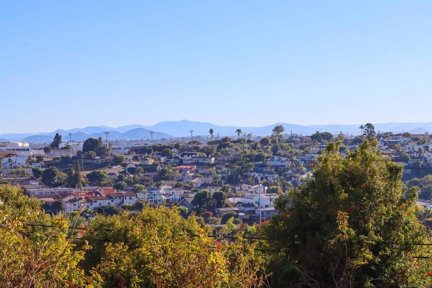 Nestled on a quiet street with Sprawling Panoramic Views from Mountains to Downtown Skyline! Located in the Point Loma area, This oversized .24-acre lot offers room for your own playground. The generously sized home features an open floor plan. The main level boasts 3 bedrooms and 1.5 bathrooms, flowing into the kitchen/dining area with Mountain and City Views. The lower level provides additional living space, including a great room, workshop, and yard access. The home has 4 + bedrooms, 2.5 bathrooms, 1,955 sq ft, and a 2-car garage. Renovated in 2013.