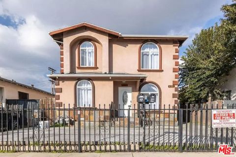 Photo of 819 E 73rd Street, Los Angeles, CA 90001 (MLS # 25607569)