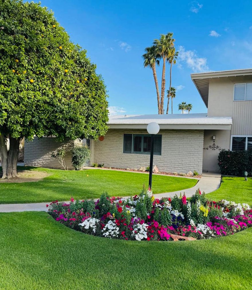 Rarely available and incredibly charming ''dollhouse'' boasting vaulted beamed ceilings, sleek tile flooring and custom features galore.  The only unit of this type with 2 bathrooms. You'll love the plantations shutters, cozy outdoor living spaces, 3 skylights, built-in gas wall fireplace and original checkerboard ceiling design in the great room.  Located in a quiet location, this one level home with no steps is close but not too close to the pool & spa. The newer mini-split HVAC system is perfect for lower utility bills plus you have your own interior washer & dryer. Each unit has a designated carport with storage above.  Situated on over 12 acres Desert Braemar is a low density co-op community, called the 'hidden gem of the desert'. Every amenity is yours including pool/spa, gym, library, workshop, tennis/pickleball, putting green, lawn bowling, shuffleboard, clubhouse with amazing kitchen and terrace, on site manager M-F. Your co-op monthly fee includes all amenities, maintenance, water, sewer, trash, Spectrum high speed internet plus cable including HBO and Showtime AND YOUR PROPERTY TAXES! Snap it up! Desert Braemar is a Stock Cooperative and each owner is issued a 'stock certificate granting a specific number of shares of the complex with exclusive use of a particular unit.  Cash sales only.  Better hurry on this one before it gets away!