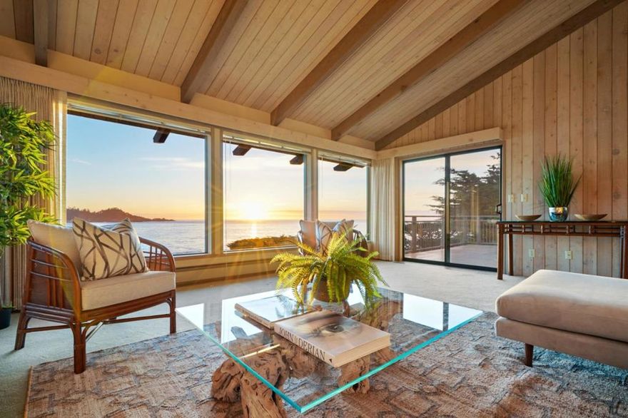 Meander through your storybook garden in Carmel, one of America's stunning jewels, as you gaze at the horizon from your rare, oceanfront estate. Situated on sought-after Ribera Road, this mid-century masterpiece displays panoramic ocean views of the Point Lobos Nature Reserve, Ribera Beach, and Monastery Beach from nearly every room, thanks to the genius of architect Richard Hicks. Infused with an effervescent energy, this three-story manor offers a parade of serene moments from outdoor decks, discrete spaces lush with blooms, and through generous windows that showcase the majesty of land meeting sea. Step through the back gate to put your toes in the sand, or choose from an assortment of walking trails throughout the elegantly understated Carmel Meadows neighborhood. Here, paradise is yours.