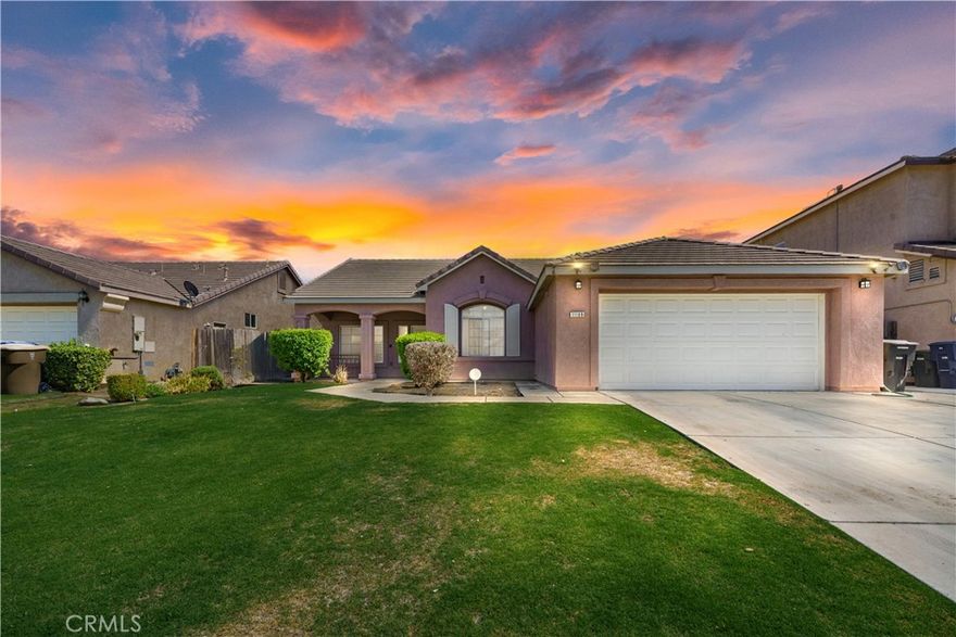 Move-in ready 4-bedroom home in SW Bakersfield. This updated property features a split-bedroom layout with dual living spaces: a formal living room and a family room with a fireplace. The kitchen is ready for cooking. The low-maintenance yard is perfect for easy living. Fresh paint and new flooring make it a great value.