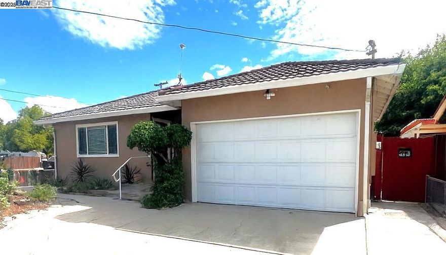 Welcome to 3491 Madeira Way, a charming three-bedroom, one-bath single-family home located in Livermore. This thoughtfully updated home offers approximately 1,038 sq ft of living space on a spacious 5,116 square foot corner lot, with comfortable indoor-outdoor flow.  The home features a remodeled kitchen with updated appliances and modern finishes, an upgraded bathroom, and stylish new tile flooring. Three well-sized bedrooms offer ample natural light and storage, while an attached two-car garage doubles as a workshop enthusiast’s dream—complete with built-in workbench, air compressor, and air tools included. Outside, the fenced yard includes mature landscaping explore ADU or RV potential.  Located just minutes from Livermore’s thriving downtown, this home sits in a community that has transformed from a rural pass-through into one of the East Bay’s most dynamic and culturally rich cities. Residents enjoy walkable access to parks, top-rated schools, and vibrant retail and dining destinations along First Street and Railroad Avenue. A property in one of Livermore’s most established residential pockets.   Photos include virtually staged and digially enhanced. Original photos are included too.
