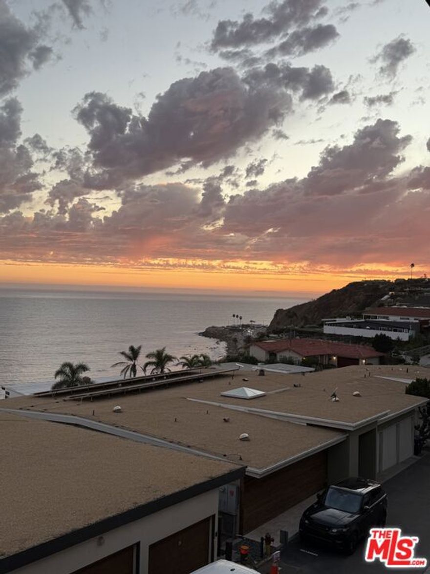 Enjoy coastal living in this spacious, light and bright 2 bedroom 2 bathroom apartment. It features an open floor plan, full-size washer/dryer, large balcony, and panoramic ocean views.   The open floor plan flows seamlessly toward the head-on ocean views.  Enjoy the sound of the waves crashing on the beach while sipping coffee on your balcony.  Catch the occasionally migrating whale.  Or simply relax and enjoy the tranquility as you gaze at the ocean from your bed.  Great location as you can walk to the Getty Villa or a 6 minute walk to the beach.  13 minute drive to Santa Monica.  12 minute drive to Malibu Pier.   Easy to show!