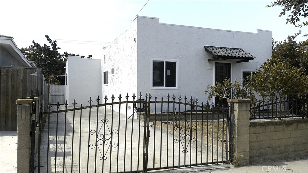 Welcome to this opportunity of a beautifully remodeled single-family home nestled in a quiet residential neighborhood of Wilmington, Los Angeles. This inviting 3-bedroom, 1-bathroom home seamlessly blends modern upgrades with timeless charm, offering comfort, functionality, and style. Step inside to discover a bright and open living space with new flooring, recessed lighting, and fresh interior paint throughout. The heart of the home is the updated kitchen, featuring new countertops, upgraded cabinetry, and stainless a steel hood — perfect for home chefs and entertainers alike. Outside, enjoy a spacious backyard with plenty of room for gatherings, gardening, or potential future additions. A long driveway provides ample parking, this is truly a must see!!