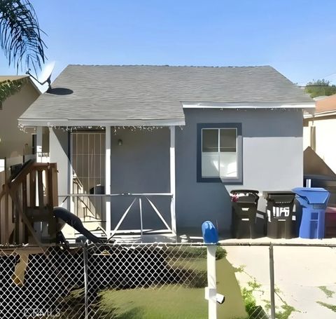 Photo of 10743 Weigand Ave, Los Angeles, CA 90059 (MLS # TR26041793)