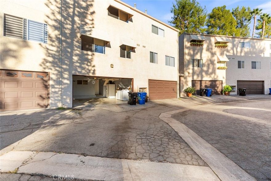 Welcome to this beautifully updated tri-level townhome in the sought-after Cabrini Villas community of Burbank. Offering approximately 1,244 sq. ft. of comfortable living space, this 2 bedroom, 2.5 bathroom home combines privacy, convenience, and resort-style amenities.



The first level features a direct-access garage and a versatile bonus room, perfect for a home office, gym, or creative space. Upstairs on the main floor, you'll find an inviting open-concept layout with a spacious living room and fireplace, a well-appointed kitchen with ample cabinetry, a powder room, and a private patio ideal for relaxing or entertaining.



The third level is home to dual primary suites, each with a private bath and walk-in closet. One suite includes its own balcony with sweeping mountain views.



Nestled in the hills above Glenoaks Blvd near Villa Cabrini Park, this home provides easy access to major freeways (134, 101, and 5) as well as Burbank's vibrant dining, shopping, and entertainment. With stunning hillside views and a prime location, this townhome is truly a must-see.