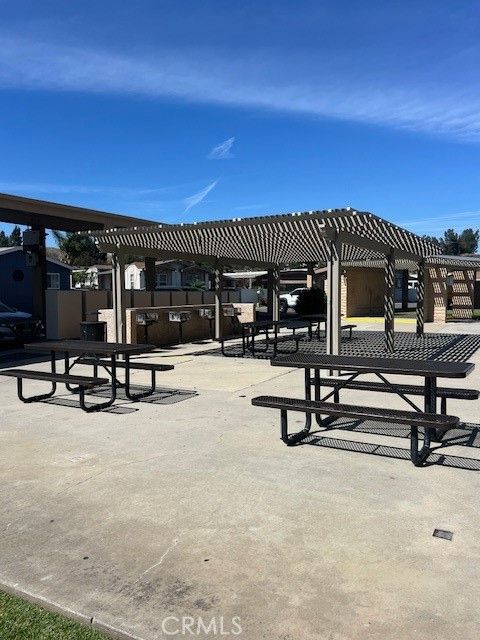 Tiny photo for 4901 Green River Rd #104, Corona, CA 92878 (MLS # OC26088066)