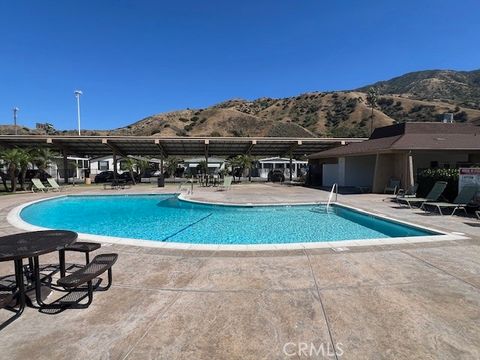 Tiny photo for 4901 Green River Rd #104, Corona, CA 92878 (MLS # OC26088066)