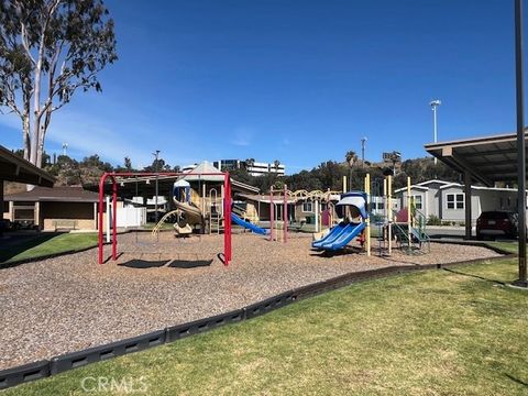 Tiny photo for 4901 Green River Rd #104, Corona, CA 92878 (MLS # OC26088066)