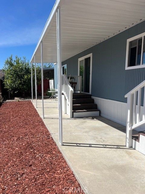 Tiny photo for 4901 Green River Rd #104, Corona, CA 92878 (MLS # OC26088066)