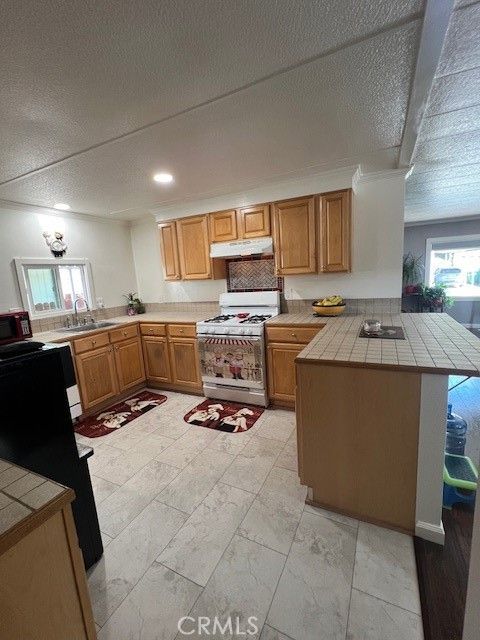 Tiny photo for 4901 Green River Rd #104, Corona, CA 92878 (MLS # OC26088066)