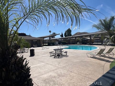 Tiny photo for 4901 Green River Rd #104, Corona, CA 92878 (MLS # OC26088066)