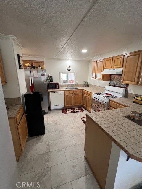 Tiny photo for 4901 Green River Rd #104, Corona, CA 92878 (MLS # OC26088066)