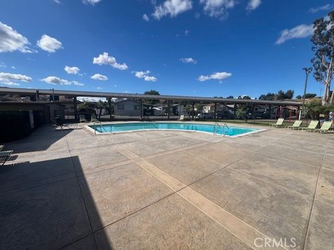 Tiny photo for 4901 Green River Rd #104, Corona, CA 92878 (MLS # OC26088066)