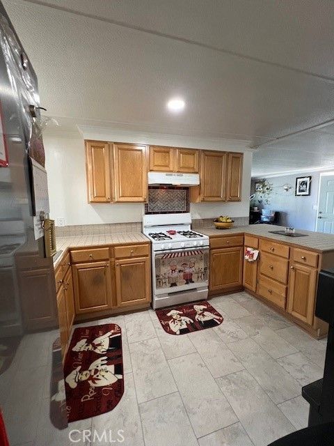 Tiny photo for 4901 Green River Rd #104, Corona, CA 92878 (MLS # OC26088066)