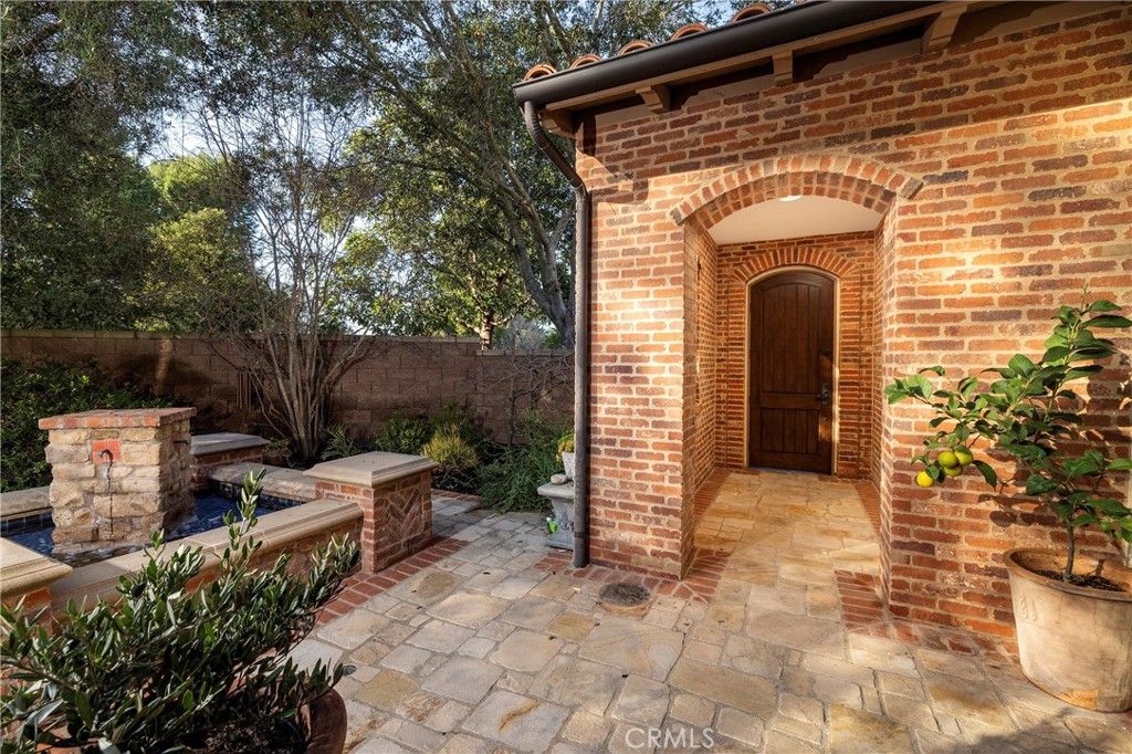 Photo of 46 Woods Trail Trl, Irvine, CA 92603 (MLS # OC26016339)