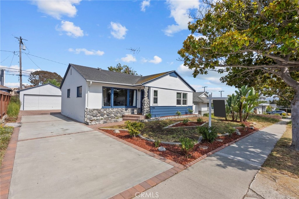 Set on a tree-lined street in one of Torrance’s most desirable neighborhoods, this 3-bedroom, 2-bath home offers a rare opportunity to own in Southwood—where homes are tightly held and rarely come to market. The home sits on a spacious 5,500 SF lot and features a light-filled interior with hardwood floors and a smart layout that places all three bedrooms in their own wing. The kitchen and bathrooms have recent updates, including newer countertops, backsplash, and tilework, while some original charm and features remain—offering a chance to make it your own over time. The primary bedroom includes its own ensuite bathroom, adding privacy and comfort. A glass-enclosed porch adds a flexible bonus space with a view of the backyard. Outside, you'll find a spacious backyard and a quiet setting. Located across from Jefferson Middle School and just minutes from other award-winning West Torrance schools, local shopping, dining, and the beach, this home blends charm, opportunity, and an unbeatable location.