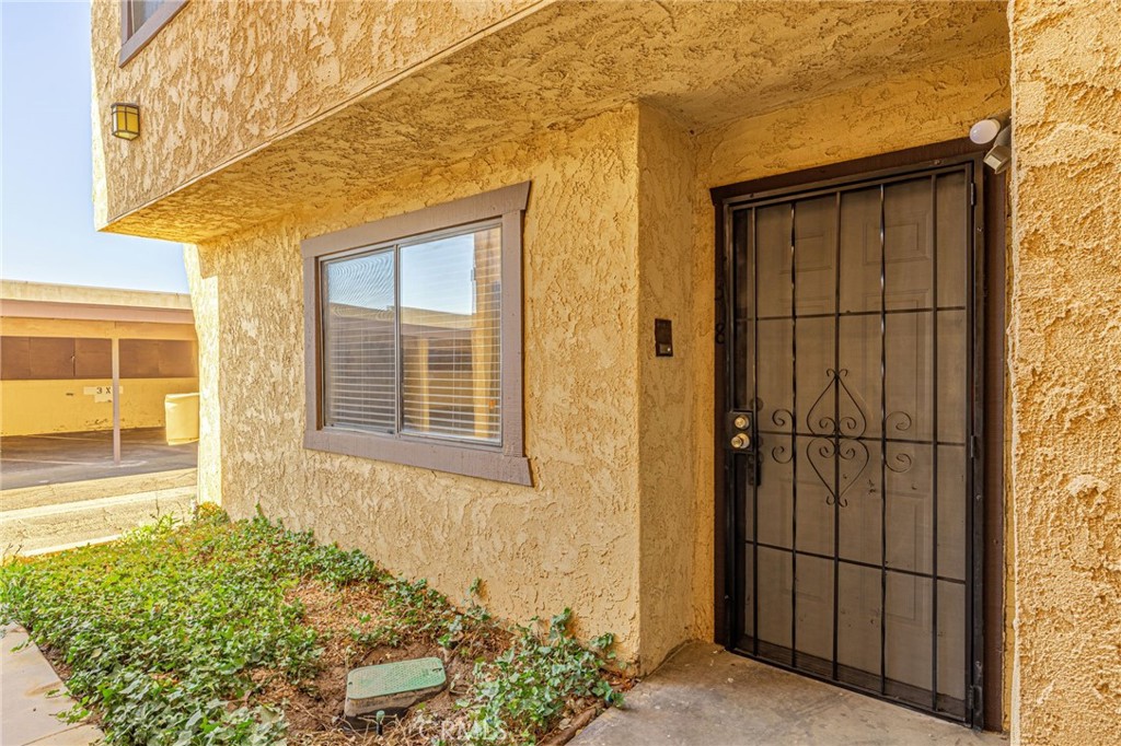 Move in ready townhouse in a very walk able community. Spacious bedrooms and beautiful finishes throughout. Located close to shopping, schools, restaurants, medical facilities and commuter friendly. Low HOA fees cover water, sewer, trash services, pool and exterior maintenance. Laundry area conveniently located on the second floor. Two Large bedrooms upstairs and 2 full bathrooms. Spacious and inviting living room with a floor to ceiling fireplace and a dining area with lots of natural light pouring in from the enclosed patio area. The kitchen is updated with beautiful quartz countertops and all new stove and microwave. Central Air Conditioning and furnace all new in 2024. All new flooring - vinyl flooring downstairs and new carpet upstairs. Half bath downstairs for easy access. Call for your appointment to see it today.