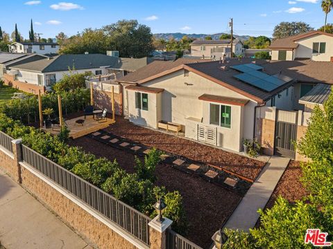 Photo of 16233 Parthenia Street, North Hills, CA 91343 (MLS # 25607925)