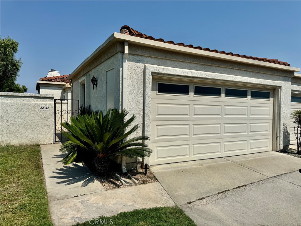 RARE MALLORCA OPPORTUNITY.... A three BR, 2.5 bath "Grandesa" with a two car direct access garage and no one else above or below has come onto the market in the exclusive community of Mallorca nestled alongside Lake Mission Viejo. As this is an end unit, the only neighbor you have is beside you on one side. An "upside-down" two-story plan, nearly all of your activity takes place at street level where you find the LR, DR, kitchen, nook, primary bedroom suite, laundry, guest bath and exactly zero stairs on that entire upper level. Experience panoramic views of glorious sun rises/moon rises, majestic mountains, rolling hills, twinkling city lights, and peek-a-boo views of both shimmering Lake Mission Viejo and the activity at North Beach all from your living room balcony. The home itself has a remodeled kitchen with Shaker style cabinets that include a soft close feature, colorful subway style backsplash, quartz counters and stainless steel stove/oven/sink/faucets/microwave/dishwasher and accent handels. Other features include textured ceilings, plantation window shutters, new laminate flooring and a freshly painted interior; this place is ready to go! it is worth mentioning the included Mallorca amenities. This private community features a 24/7 manned gate for added peace of mind and security. Residents enjoy exclusive access to Mallorca's private beach, complete with a sandy shoreline, a designated swim area, 14 picnic tables, 4 BBQ stations, lounge chairs, a cabana, 2 restrooms and a convenient outdoor shower area to rinse the sand off after a day in the sun. For boating enthusiasts, the community offers 72 in-water boat docks and additional dry docks for paddleboard storage. Or, you can always go to the North Beach Facility and rent boats by the hour. Take a stroll along the Mallorca lakeside promenade, where aquatic views and the soothing sounds of the water splashing against the bulkhead contribute to the tranquil, scenic walking path. For more traditional relaxation, Mallorca boasts two pool and spa areas, perfect for unwinding or working on that tan with friends and family. Lake Mission Viejo itself is also a true highlight. As a lake member, you’ll enjoy access to year-round boating and swimming, the Summer Sunset Concert Series, Movies-Under-the-Stars, a spectacular fireworks show, beach volleyball, the popular “Taste of the Lake” picnic, and access to lakefront clubhouses for events and gatherings. Why not step up and take advantage?