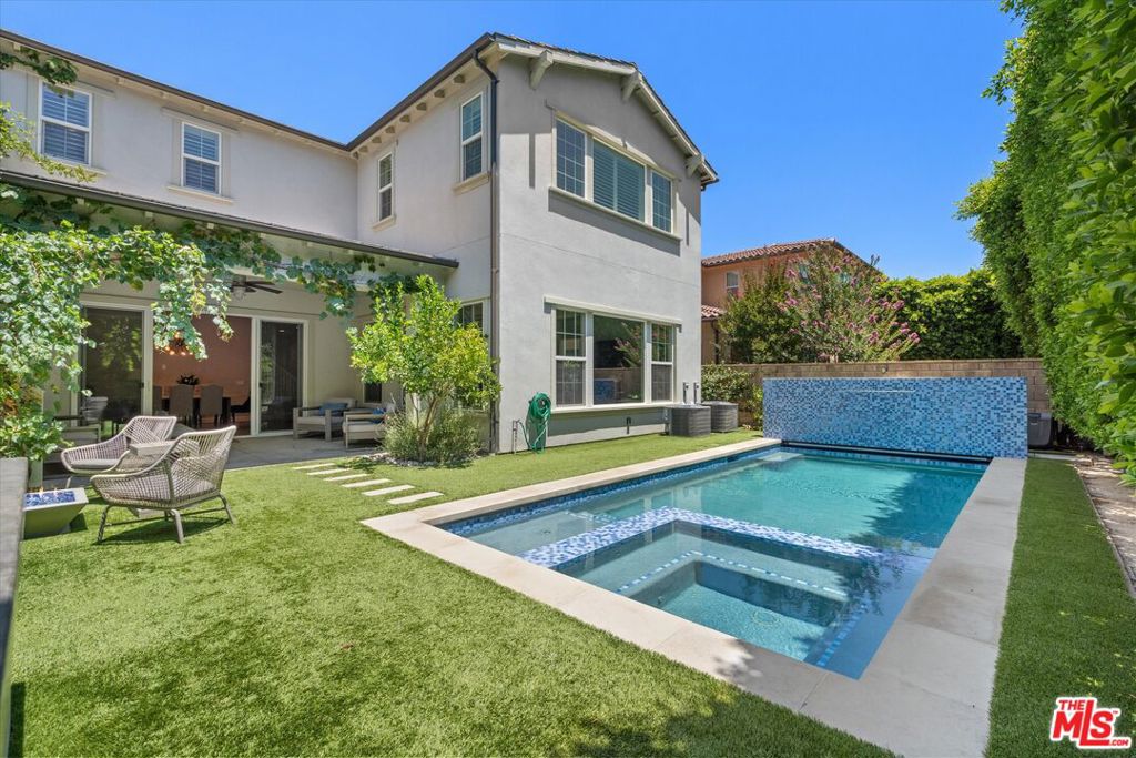 Centrally located in the heart of Sherman Oaks, this spacious and stylish two-story home offers 5 bedrooms, 6 bathrooms, and a dedicated home office across just under 3,600 square feet of functional living space. Ideal for those seeking room to grow, this property features a thoughtfully designed layout with generous entertaining areas, modern amenities, and refined finishes throughout. The gourmet kitchen is equipped with top-of-the-line Wolf and Sub-Zero appliances, perfect for daily living and hosting guests. Enjoy seamless indoor-outdoor living with a private backyard oasis complete with a sparkling pool and motorized cover, built-in outdoor kitchen, and plenty of space for lounging or entertaining. Additional highlights include dual-zone HVAC, an electric 220V outlet for EV car charging in the garage and a bright, dedicated home office ideal for remote work. Located within the highly regarded Kester Elementary School District, and just minutes from the shopping, dining, and vibrant energy of Ventura Boulevard, this home offers the perfect blend of comfort, convenience, and luxury.