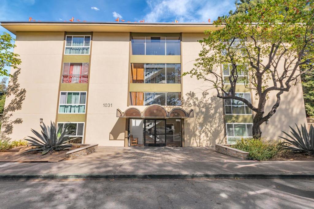 Condominium convenience awaits in the heart of Silicon Valley! With one of the best locations in the building, this top-floor unit has treetop views and a spacious floor plan. The living area is complemented by a large private balcony that fills the space with natural light, laminate floors throughout the living and dining area, granite kitchen with stainless steel appliances, recently painted throughout, new carpets, double-pane windows and in-wall air conditioning. The generously sized master bedroom boasts ample closet space and both bathrooms have been tastefully remodeled, The added convenience of an indoor washer and dryer, a gated underground garage and elevator makes this condo a comfortable place to live. Community amenities include a swimming pool, sauna, access to Stevens Creek trail, BBQ areas, game zones, and picnic tables. The building offers secure lobby entrance, elevators, a ping pong/pool table room. Close to grocery stores, bakeries and restaurants. Only minutes from Google and Apple. Easy access to major highways (280, 101, 85, 237) Great Mountain View School District.
