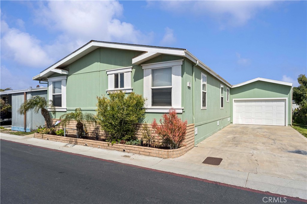 BEACH-STYLE LIVING WITHOUT THE BEACHFRONT PRICE!
One of the lowest space rents available in this highly sought after park! Welcome to Space 184 in the desirable Huntington by the Sea gated community—ideally located just across the street from the ocean, just north of Pacific Coast Highway. This spacious home offers over 1,500 sq. ft. of comfortable, beach-style living in a vacation-like setting, without the premium price tag.
As one of the largest homes in the community, this 3-bedroom, 2-bathroom residence is perfect for a full-time family home, a relaxing vacation getaway, or even an investment property—one of the few park communities that allows rentals!
The primary suite is a true retreat, featuring a private bathroom with a soaking tub, separate shower, and a cozy sitting area that could double as a home office. With a smart layout that places the living area between the primary suite and the two additional bedrooms and bathroom, you'll enjoy added privacy and functionality.
Step outside and you're just minutes from the sand—take a short walk to the beach or hop on your bike for a quick ride to Pacific City’s popular shops, restaurants, and entertainment.
Residents also enjoy resort-style amenities, including a sparkling community pool and spa, clubhouse, gym, dog park, and more—all in a gated, security-patrolled neighborhood.
Don’t miss this opportunity to own your slice of beachside paradise—just in time for summer!