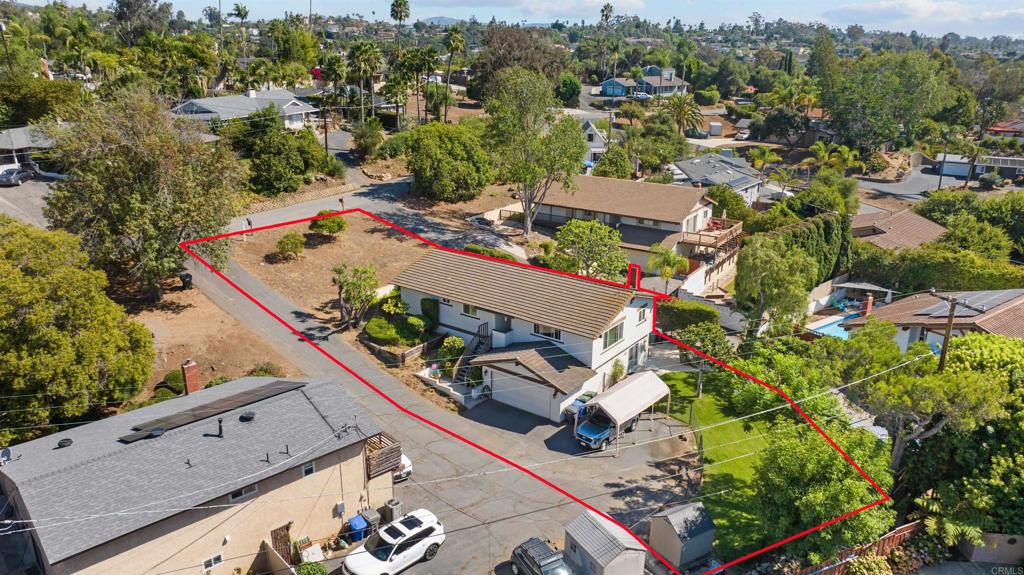 Excellent opportunity to own in the popular Alta Vista neighborhood known for its elevated topography, gorgeous views, distance to DOWNTOWN VISTA and easy access to 78 freeway! This solar powered .. all electric home has a true up electric bill of only $21/year! Solar is paid in full and no gas bills or hoa bills makes this more affordable then most properties! A new roof was installed in 2017, includes all dual pane vinyl windows and slider and termite work has been completed with recent clearance on file! The floor plan is functional with room to have 2 primary suites, jr adu, or in law quarters! The main floor includes 4 large bedrooms with a huge living room, dining room and kitchen all with views that feel like you're in a treehouse. Downstairs does have a separate entrance with easy access and includes a large living area with its own bathroom and a fireplace! The 10,700 sq ft lot is large enough to add more driveway space/RV or potentially build an ADU! Come discover why Alta Vista is one of the most desirable places to live in San Diego County!