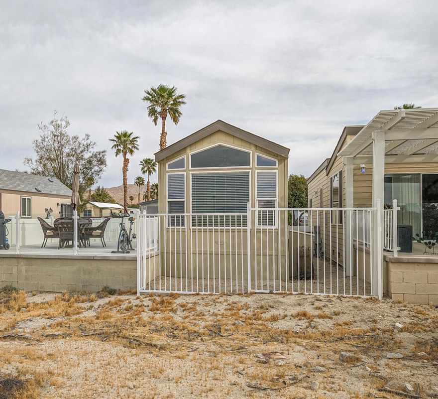 Spectacular and prime location close to the Clubhouse with this 2006 ~400 sq. ft. Laurel Crest Park Model home with sweeping and unobstructed views of Mt. San Jacinto. Come find your vacation getaway to the sun and desert with this immaculate, efficient, and well-maintained 1 bedroom, 1 bath, travertine flooring throughout, modern finishes, and volume ceilings. Sunbathe on your deck surrounded by glass railing for viewing pleasure to take in all the magnificent beauty and desert scenery, additionally, a finished shed with possible washer/dryer connection and a new HVAC system. This jewel is in the premiere Caliente Springs 55+ Resort and offers top notch amenities to soothe your every desire including mineral hot spring fed pool and spas, fitness center, 9-hole golf course, 8-pickleball courts, tennis courts, full laundry facilities, library, chapel services all in a fun and active community. Bring offers, make new friends, and call this home. Lot is not owned; space rent is $811 (subject to change). Easy lender financing (OAC).