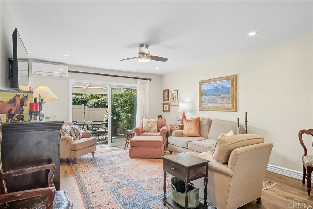 Welcome to this new listing in the highly sought after 55+ community of the High Country Villas! Situated on a quiet cul-de-sac this 2 bedroom, 1 bath townhome was remodeled to perfection just 2 years ago- some of the many renovations that had been done include new windows, engineered wood floors throughout, an open kitchen featuring KitchenAid appliances, quartzite countertops, breakfast bar, pantry, ample cabinet space, air conditioner and an indoor laundry closet . The primary bedroom offers custom shelving in closet and the bathroom has a large walk-in shower with designer tile and finishes! In addition there are 2 patios and a one car finished garage with epoxy flooring. The private garden patio is perfect for outdoor dining, entertaining or just pure relaxation! Enjoy the many amenities that this wonderful community has to offer and the convenient proximity to shops, restaurants and just minutes to the finest beaches around!
