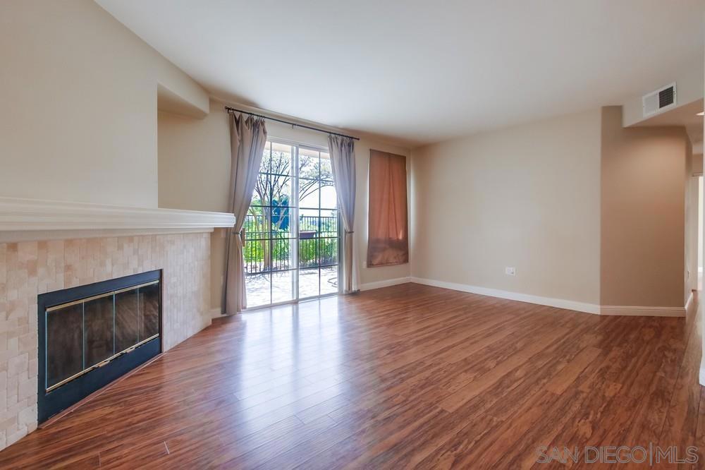 Private corner lower level property in the Collage complex with wood floors throughout & central A/C. One car attached garage and in a great location with easy access to 15 freeway and shopping. Complex features pool, trash service included in the monthly rent. Minimum 700 credit score and 2.5 times the monthly rent for income required. Green in kitchen and bathroom has been changed to white!!