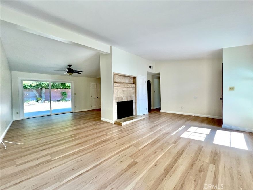 Updated West Hills Home for Lease!!! Enjoy comfortable living in this bright, updated West Hills home located on a quiet, tree-lined street. Featuring an open, light-filled living space, upgraded kitchen with quartz counters and stainless steel appliances, vaulted ceilings, spacious bedrooms, versatile bathrooms, and a large private backyard with patio—perfect for relaxing or entertaining. Additional features include newer flooring, recessed lighting, newer central A/C and heat, and an attached garage. Conveniently located near shopping, dining, parks, and top-rated schools. Gardening service included in the rent. Ready for immediate move-in.