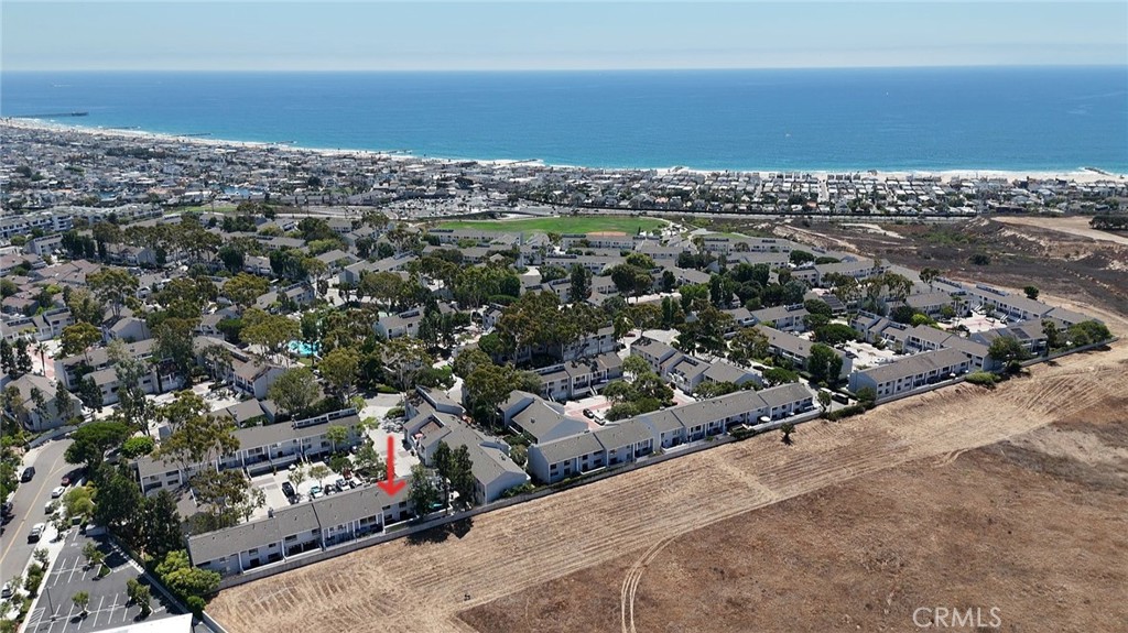 Amazing View Townhome in Newport Crest. Located along back property line with private patio on Bluff Open Space adjacent to Sunset Ridge Park- Watch the Sunsets & some Coastline Views. Must see to appreciate! Immaculate 2 story Townhome with lots of light and open Floorplan. 2 car attached Garage below with laundry hookups. Washer and dryer provided. Oak Hardwood flooring throughout. Kitchen has been remodeled with Custom Cabinets, granite Countertops, stainless Appliances. Crown Molding, Gas Fireplace in Living Room w Custom Shutters. Good sized Master Suite has updated Master Bath with Great Views. Added Room on 2nd Floor allows study and Views as well. Your own private Sauna! Newport Crest is well located - close to the Beach, Bay, Hoag Hospital and all the Fun Life Style of Newport Beach. Like Living in a Resort! Community Tennis, Pool & Spa.
