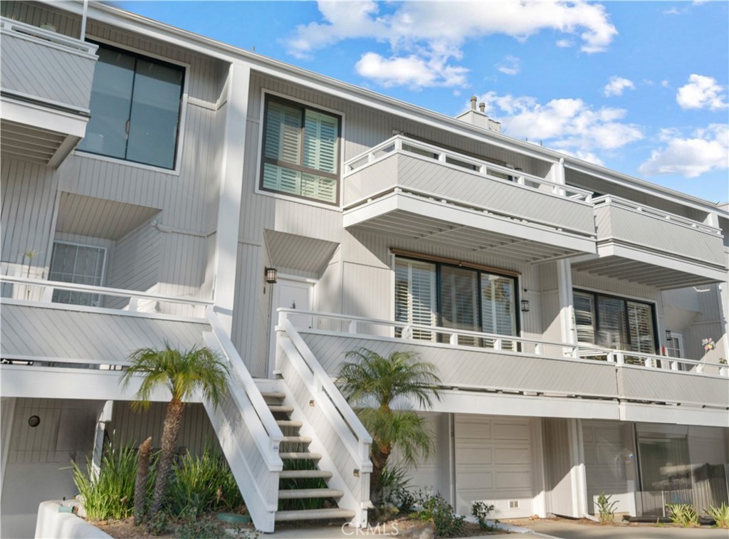 Amazing View Townhome in Newport Crest. Located along back property line with private patio on Bluff Open Space adjacent to Sunset Ridge Park- Watch the Sunsets & some Coastline Views. Must see to appreciate! Immaculate 2 story Townhome with lots of light and open Floorplan. 2 car attached Garage below with laundry hookups. Washer and dryer provided. Oak Hardwood flooring throughout. Kitchen has been remodeled with Custom Cabinets, granite Countertops, stainless Appliances. Crown Molding, Gas Fireplace in Living Room w Custom Shutters. Good sized Master Suite has updated Master Bath with Great Views. Added Room on 2nd Floor allows study and Views as well. Your own private Sauna! Newport Crest is well located - close to the Beach, Bay, Hoag Hospital and all the Fun Life Style of Newport Beach. Like Living in a Resort! Community Tennis, Pool & Spa.