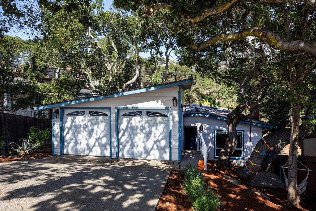 Welcome home to 2652 Ponce Avenue, a charming 3- bedroom, 2-bathroom home nestled amongst stunning mature oaks on a sprawling 8,500 sq ft. lot. Located in this highly coveted neighborhood of Belmont, this home offers breathtaking views of Belmont Hills and beyond, creating an atmosphere of tranquility and natural beauty. Step inside to discover an airy living space, highlighted by large windows that frame picturesque vistas. Retreat to the primary bedroom, complete with an en-suite bathroom and walk-in closet with access to the outside deck. The two additional bedrooms share a remodeled hall bath with double vanity, offer versatility for family, guests, or a home office. Outside, a private deck provides an ideal setting for outdoor gatherings, whether you are enjoying a quiet morning cofee or hosting a lively evening bbq. The lot offers endless possibilities for home expansion, gardening, or play or simply basking the the beauty of the natural surroundings. Excellent Belmont Schools and Carlmont High. Additional highlights: remodeled bathrooms, New roof ~ approx. 1 year old, new skylights, large basement area w/ ample storage or opportunities to expand.