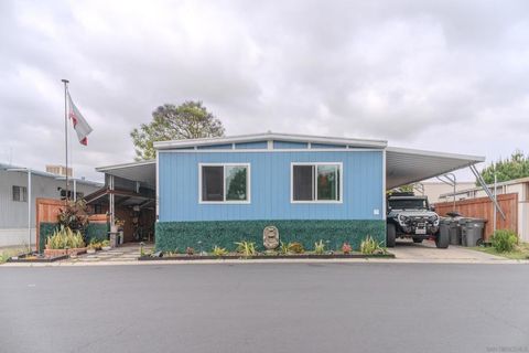 Photo of 10800 Woodside Avenue Ave #SPC 62, Santee, CA 92071 (MLS # 260009453SD)
