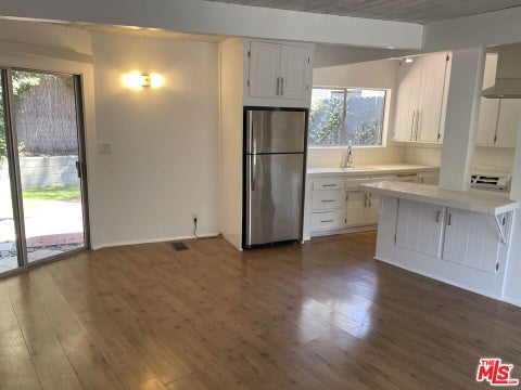 Photo of 2154 N BEVERLY GLEN Boulevard, Los Angeles, CA 90077 (MLS # 26874805)