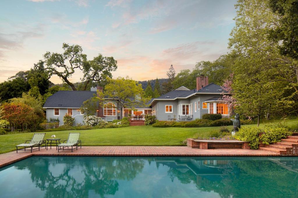 New Price! Spectacular views of Western Hills from this light-filled 5BR/4.5BA approx 6,420 sq ft Central Woodside home on approx 3.27 fully usable acres close to Woodside Town Center shops, restaurants, freeway access and in the acclaimed Woodside School District. Efficient, mainly one level, floor plan w/large primary suite and separate living & family rooms & eat-in kitchen lead to outside deck overlooking large rear lawn and pool with adjacent spa. Separate approx 285 sq ft detached office with nearby chipping and putting green and attached potting shed to accommodate the grounds wonderful gardens; Detached 4-stall stable with tack room and hay storage, separate turnouts, large riding ring and surrounding corral. Come see this amazing estate in the heart of it all!