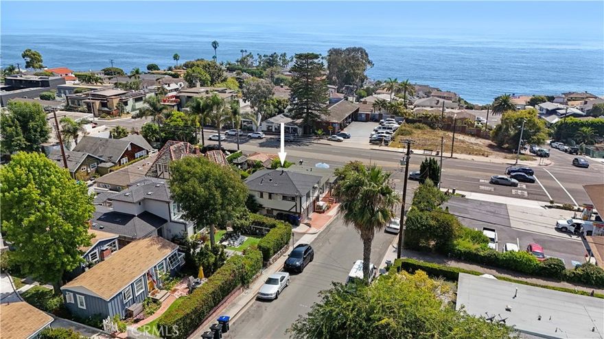 1290 N Coast Hwy, Laguna Beach Unit #C presents an exceptional opportunity to enjoy coastal living at its finest. This light-filled one-bedroom apartment captures stunning ocean views and embodies the vibrant, artistic charm of North Laguna. Just one block from the sand, the home invites you to start each day with beach walks and end it with unforgettable sunsets over Crescent Bay. Inside, the residence showcases a beautifully updated kitchen with stainless steel appliances, marble countertops, and a sleek glass tile backsplash. Soaring 12-foot ceilings with exposed beams enhance the open, airy feeling throughout the living room and bedroom. The remodeled bathroom features dual glass vessel sinks, elegant tile flooring, and a refined modern design. A small office nook with ocean views provides a serene space to work or unwind. The unit includes one designated parking space, access to free community laundry, and convenient street parking. Perfectly positioned in one of Laguna’s most desirable neighborhoods, this unfurnished apartment blends style, comfort, and the quintessential beach lifestyle.