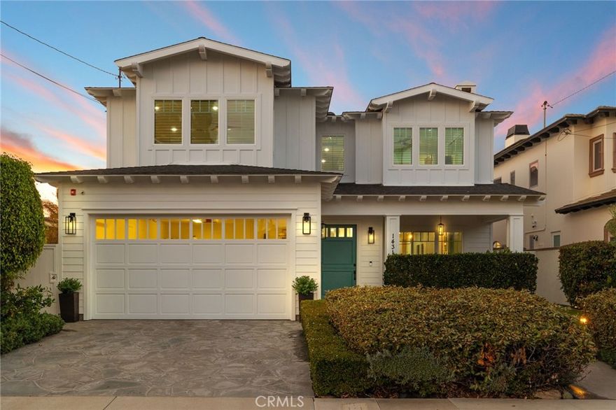 Discover a rare opportunity for refined living in this newly updated Manhattan Beach custom residence, thoughtfully refreshed with an interior designer's touch. Located on a desirable street, this home masterfully blends coastal elegance and functional design with its sophisticated interiors and a magnificent outdoor space.



The property features 5 bedrooms and 4 beautifully appointed bathrooms in 4,431 sf of living space. Rich French oak floors and tasteful crown molding flow throughout, creating an atmosphere of warmth and timeless elegance. Modern amenities like an integrated sound system, outdoor security cameras, central vaccum system, a dedicated theater room, and a convenient laundry room, and a three-car garage enhance daily living.



The stunning Chef's kitchen, designed for discerning tastes is appointed with high-end appliances such as a Sub-Zero fridge, a professional-grade six-burner Thermador stove, an integrated Miele espresso maker, a Villeroy & Boch prep sink, complemented by an expansive quartzite island, abundant counterspace, and a generous walk-in pantry.



The property’s true highlight is the expansive, sun-drenched backyard—a rare Manhattan Beach feature. Surrounded by mature trees for privacy, this space is a resort-style paradise centered around a stunning heated pool and spa with a fun waterfall feature, outdoor shower, designated bathroom, bocce court, pizza oven, a spacious green area, and a comfortable seating space with a fireplace and TV.



This property offers an unparalleled retreat from the daily hustle. It is a quiet, private legacy property where every detail has been thoughtfully considered to deliver the quintessential Manhattan Beach experience.