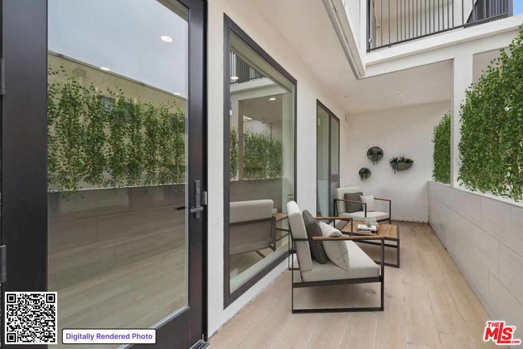 Photo of 505 S Barrington Avenue #104, Los Angeles, CA 90049 (MLS # 26655713)