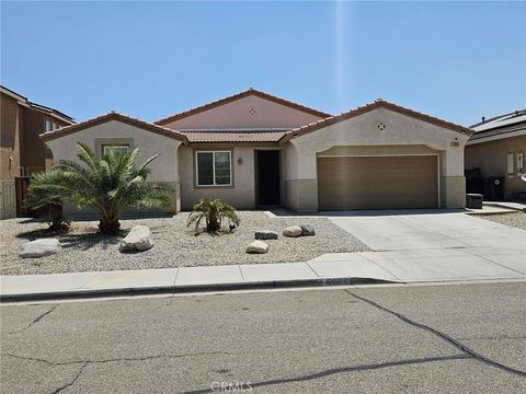 Photo of 13023 13023 Camino De Oro Place, Victorville, CA 92394 (MLS # DW25230209)